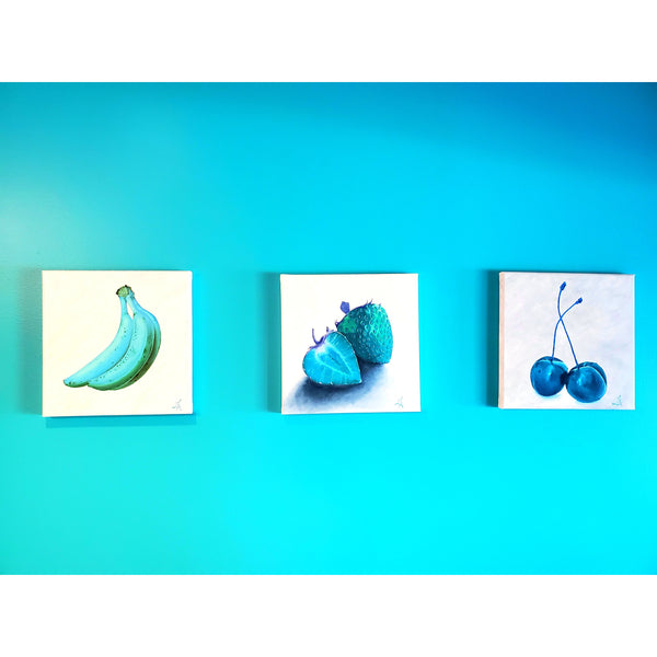 image of teal fruit painting collection including teal bananas strawberries and cherries